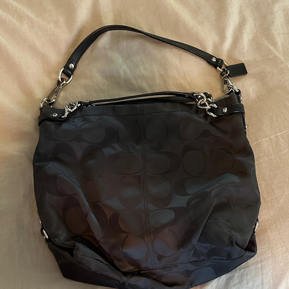 Coach Black Shoulder Bag with Slouchy Silhouette and Silver Accents
